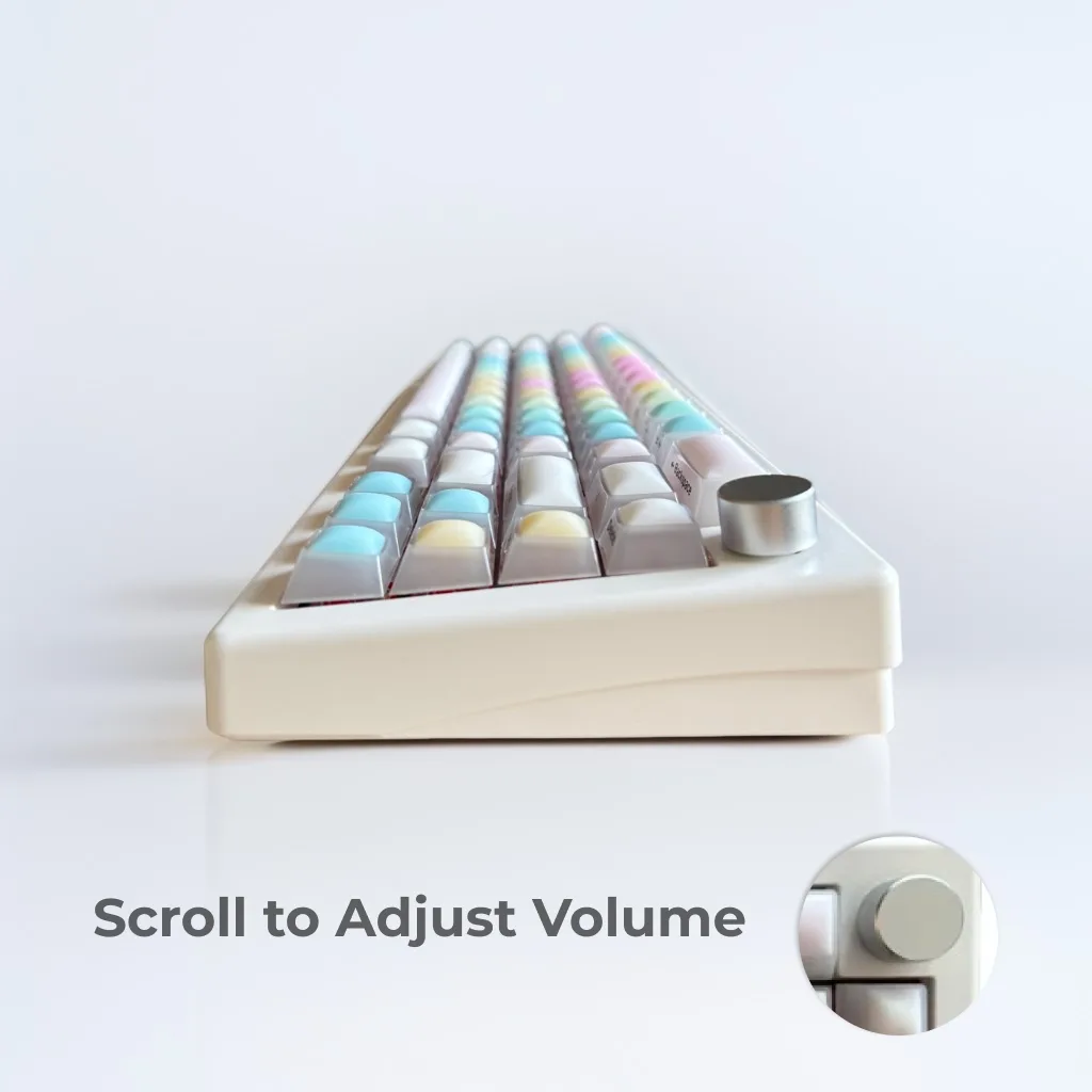 Side view of the TAPÉ Daydream pastel mechanical keyboard with rainbow gradient keycaps, showcasing a slim, nail-friendly design for long nails.